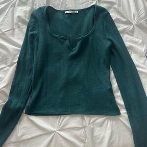 I am selling this cute dark green long sleeve shirt from Abercrombie and Fitch.